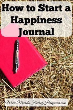 a notebook and pen sitting on top of hay with the words how to start a happiness journal