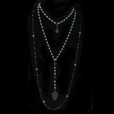 The Black Madonna is the focal point of this double strand Pacific Opal necklace. It joins with a toggle that has a built in 4" extender to allow it to be worn longer. Boho and full of Spirit we love black medals because they add that little bit of edge and cool factor to our necklaces. The strand that drops is adorned with three Fleur de Lis Crosses. Designed as "everyday" wear to keep the Special Graces promised by Our Lady close at hand. Length: Double Stranded, the short strand is 16" with a Black Madonna, Saint Joan Of Arc, St Joan, African Turquoise, Love Black, Christian Jewelry, Opal Crystal, Multi Strand Necklace, Opal Necklace