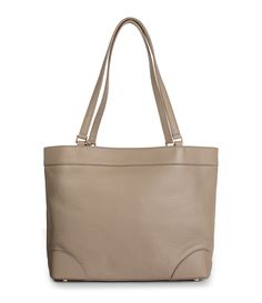 Crafted of pebbled Italian leather in a versatile taupe hue, the Charleston tote really holds its own when it comes to style and organization. Designed for season-to-season everyday use, it has a magnetic top closure that opens to reveal a green lining for easy spotting of your keys or lip balm. Stash essentials in the two interior open pockets or the zipped back pocket. This wide and roomy tote has reinforced corners with feet, making it a sturdy, stylish sidekick. Plus, the shoulder straps hav Straw Bags, Clean Cotton, Quiet Luxury, Small Pouches, Coin Pouch, Metallic Accents, Luxury Accessories, Gold Tone Metal, Cleaning Clothes