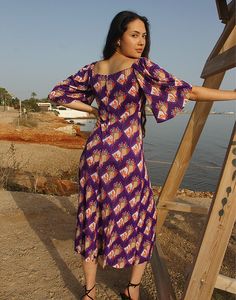 Long 70s dress in purple floral print. Square neckline. Wide short sleeves. Rear zipper. Size S, EU 34-38 / UK 6-10 Measurements: 32"/ 81cm bust - 26" / 66cm waist - 36" / 91cm hips - 16" / 41cm sleeve length - 49" / 124cm dress length. Condition - Excellent. Material - Polyester. Sustainability - Vintage. Handpicked, repaired and ready to wear. This is an original vintage item, not new and minor signs of wear and age are expected, we will highlight any major flaws. Model is a UK 6/8 and 5'7" tall Fitted Purple Printed Midi Dress, Purple Short Sleeve Bohemian Midi Dress, Purple Floral Print Short Sleeve Midi Dress, Vintage Purple Dress With Short Sleeves, Summer Dresses Maxi, Women Summer Dresses, Purple Floral Print, Jumpsuit Skirt, Vestidos Vintage