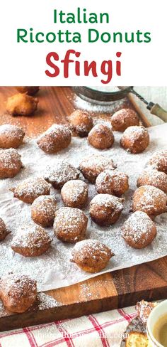 italian ricotta donuts with powdered sugar sprinkled on top and coffee in the background