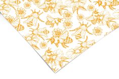 an orange and white floral pattern with bees on it