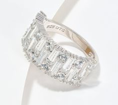 An eye-catching combination of round- and baguette-cut stones gives this ring a distinctive (and dazzling!) look.