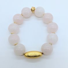 Rose Quartz is known for its calming and loving energy while the gold-plated metal adds an elegant touch. Wear it alone or stack it with other bracelets for a versatile look. Enhance your style with this stunning Rose Quartz and Gold-plated Metal Bead Bracelet. Ro & Gieo Rose Quartz and Gold-plated Metal Bead Bracelet If you want your bracelets in a different size than 7 inches, we are more than happy to accommodate your request. Please simply specify your WRIST SIZE IN INCHES into the ORDER SPE Metal Bead Bracelet, Loving Energy, Metal Bead, Brass Bracelet, Soft Toothbrush, Copper Bracelet, Special Jewelry, Beauty Favorites, Brass Jewelry