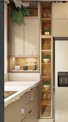 a white refrigerator freezer sitting inside of a kitchen