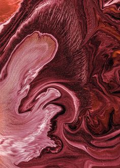 an abstract painting with red and pink colors in the center, as if it were fluid paint