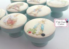 the knobs are decorated with images of peter rabbit