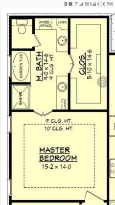 a floor plan for a small house with two master suites and an attached bathroom area