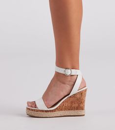 These adorable cork espadrille wedges will have you ready for weekend brunch! They feature an open almond toe with a toe strap. an adjustable ankle strap with a back criss-cross design. a sturdy cork wedge heel. and a braided espadrille trim. Complete your look with a chic handbag.Fit & Features Open almond toe. faux leather toe strap Faux leather adjustable ankle strap. back criss-cross design Metal buckle detail Cork wedge heel Espadrille trim Faux leather cushioned insole Runs true to size Trendy White Adjustable Wedge Sandals, Adjustable Ankle Strap White Wedge Sandals, Spring Wedge Sandals With Cork-bed Midsoles And Ankle Strap, Adjustable White Wedge Sandals With Buckle Closure, White Adjustable Wedge Heels, Adjustable White Wedge Heels, Chic White Wedge Sandals With Cork-bed Midsoles, Heeled Espadrilles, White Wedges