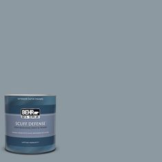 a can of behro ultra stain - blocking paint on a dark blue background