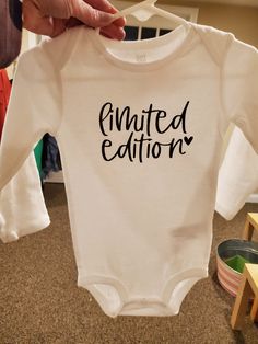 These onesie are sure to catch an eye with their cute phrases that perfectly capture life with a baby! Come in short sleeve and long sleeve and a variety of phrases. Homemade Onsie Ideas, Onsie Svg Ideas, Teacher Onesie, Girl Onesie Ideas, Cute Baby Onesies Sayings, Baby Onsies Ideas Girl, Cricut Baby Onesie, Baby Onesie Ideas, Baby Onies