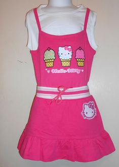 Hello Kitty by Sanrio Girls Spring Summer Skirt + Graphic Top Fushia 6 NWT Up for consideration is HELLO KITTY BY SANRIO SKIRT & GRAPHIC TOP IN SIZE 6 COLOR: FUSHIA SKIRT - STRIPED ELASTIC WAISTBAND WITH A BOW HELLO KITTY ON LEFT HIP RUFFLED HEMLINE ATTACHED SHORTS 100% COTTON MACHINE WASH AND DRY MEASUREMENTS: WAIST 22 10" - LENGTH 10 1/4" NEW WITH TAGS   TOP - MADE TO LOOK LAYERED SLEEVELESS WHITE MINI TOP SHOULDER STRAPS THREE (3) ICE CREAM CONES, ONE (1) WITH HELLO KITTY ON FRONT TWO (2) HEA Tourist Hairstyles, Hearts Hello Kitty, Hello Kitty Clothes, Ice Cream Cones, Dress Up Dolls, Crop Top Outfits, Graphic Top, Summer Skirts, Character Outfits