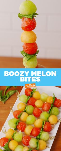 a bunch of fruit is stacked on top of each other with the words boozy melon bites above it