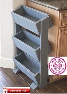 a gray shelf sitting in the middle of a kitchen