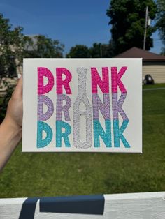 someone holding up a card that says drink drunk