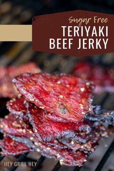 there are several pieces of meat on the grill with text overlay that reads, sugar free teriyaki beef jekky