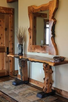 a wooden table and mirror in a room