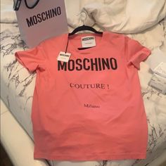 I’m Usually A Small Or Medium But Bought This Size 42 As It Runs Small And I Wanted A Baggier Look. Limited Edition Sold Out At All The Stores. Brand New. Designer Red Tops With Logo Print, Red Short Sleeve T-shirt With Cartoon Print, Pink Crew Neck Novelty T-shirt, Moschino Shirt, Moschino Teddy Bear, Moschino Sweatshirt, Moschino Tshirt, Moschino Crop Top, Moschino T Shirt