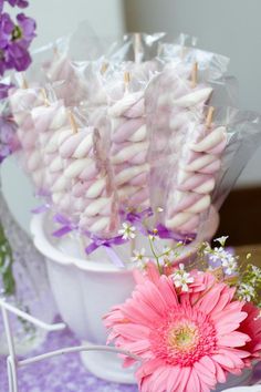 there are some food on the table with pink flowers