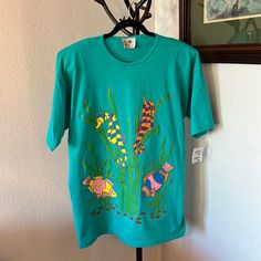 In Excellent Condition, New With Tags , Has Minor Spot On The Back , It Could Be Washed, Very Beautiful Happy Print, Cotton Great Quality, 31 Inch Long , 11 Inch Sleeve, 24 Inch From Underarm To Underarm Retro Style Blue T-shirt For Spring, Sea World, Vintage Tops, Blue Green, Tee Shirts, Womens Tops, Tops & Tees, Blue, Women Shopping