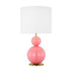 a pink lamp with a white shade on it