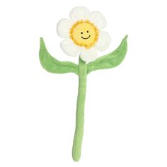 a stuffed flower with a smiley face on it