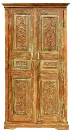 an old wooden armoire with carvings on the front and side doors, isolated against a white background