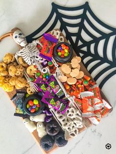 a tray filled with halloween treats on top of a table