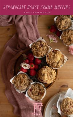 strawberry honey crumb muffins on a plate with strawberries