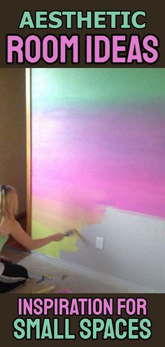 a woman is painting a room with pink and green paint