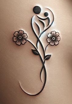 a woman's stomach with flowers on it