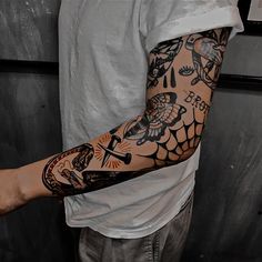 a man with a tattoo on his arm