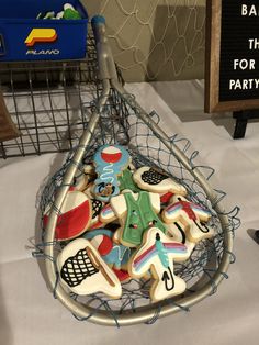 a basket filled with cookies sitting on top of a table