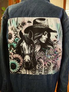 - Medium unisex size - Legendary Whitetails brand - "Stay Wild Cowgirl" print - Color of the shirt as pictured - Two front chest pockets - Snap Button front - 100% cotton shirt.   - Shirt is brand new with a custom-made patch...one of a kind!   - Custom print fabric back patch (lightweight cotton).  The patch will fray some after future washings.  Makes it even more unique:) - Perfect layering piece.  Great over a turtleneck, t-shirt, or tank top.  I am a small/medium build and I love wearing an Trendy Medium Wash Denim Jacket With Graphic Print, Trendy Graphic Print Denim Jacket, Cotton Denim Jacket With Graphic Print, Custom Artwork Long Sleeve Cotton Denim Jacket, Custom Artwork Cotton Denim Jacket For Streetwear, Medium Wash Long Sleeve Denim Jacket With Graphic Print, Medium Wash Long Sleeve Outerwear With Graphic Print, Long Sleeve Cotton Denim Jacket With Custom Artwork, Cotton Outerwear With Custom Artwork, Long Sleeve