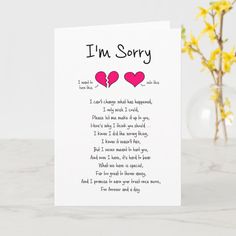 a card that says i'm sorry with two hearts on it and daisies in the background