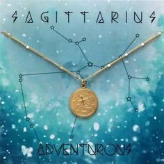 the zodiac sign necklace is shown on a blue background