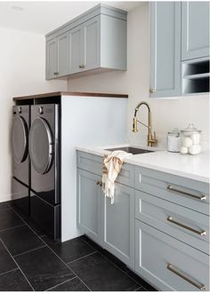 a washer and dryer sitting in a kitchen