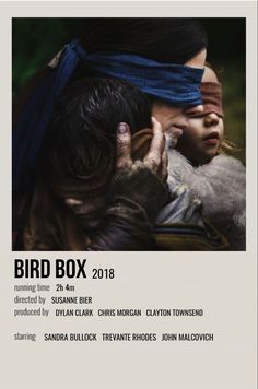 the poster for bird box is shown with an image of a woman holding a child