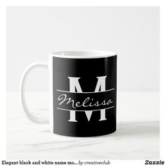 a black and white coffee mug with the word meliss in cursive font