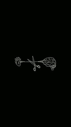 a black and white drawing of scissors cutting the brain