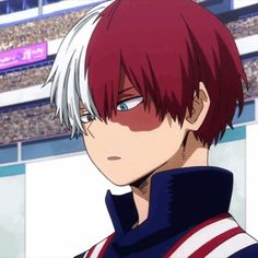 an anime character with red hair and white hair in front of a large stadium full of people