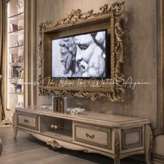 an ornate wooden entertainment center in a living room