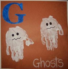 handprinted ghost and g on an orange background