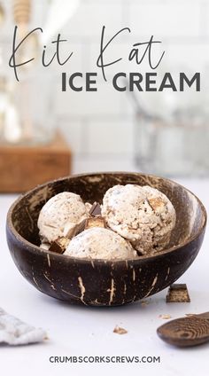 a bowl filled with ice cream sitting on top of a table