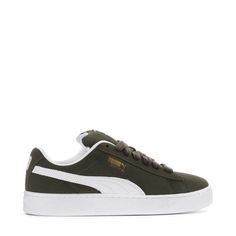 A fresh take on the classic Suede—this PUMA Suede XL is one for the wearing. Featuring an exaggerated padded collar tongue, a chunkier sole, and thick laces, this execution is inspired by the 00s but made for the modern day. A full suede upper plus a leather Formstrip make this classic, durable, and ready for everyday looks.Features: Full suede upper with leather Formstrip. Exaggerated padded collar and tongue. Mesh insole with multiple screen-printed PUMA logo. Thick laces for a throwback look. Casual Sneakers With Padded Tongue For Streetwear, Green Sporty Sneakers, Sporty Green Winter Sneakers, Casual Sneakers With Padded Tongue For Sports, Casual Green Puma Sneakers, Classic Sneakers With Padded Tongue For Sports, Casual Mid-top Sneakers With Padded Tongue, Classic Puma Sneakers For Streetwear, White Kicks