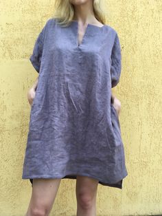 "Loose linen tunic with pockets. Great choice when you need comfortable and stylish outfit combination. You can wear it with trousers, leggings, shorts, skirts. The good thing about tunics is that you can wear them also by themselves with nothing or for example as beach cover ups. Linen tunic dress is perfect for warm days and vacation. As linen regulates body temperature, is lightweight and really absorbent, which makes it the perfect fabric for summer. ABOUT Length of this linen tunic in front Short Sleeve Linen Dress For Vacation, Relaxed Fit V-neck Linen Dress With Pockets, Relaxed Fit Short Sleeve Tunic With Pockets, Relaxed Fit Flax Linen Beach Dress, Summer Tunic With Pockets For Daywear, Short Sleeve Lagenlook Tunic For The Beach, Lagenlook Beach Tunic With Short Sleeves, Lagenlook Short Sleeve Tunic For Beach, Oversized Linen Dress With Pockets