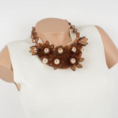 This is part of Chairish’s Costume Jewelry assortment.  Striking transparent copper Lucite or Plexiglass bib choker necklace by Italian designer Manoa2 (Milano 1980 - 1985). A collar shape with a large curved bib topped with dimensional flowers and huge pearl-like beads. Note that flowers are not glued on the bib but attached to it with gilt metal hooks, thus they are slightly shaking on the bib and move according to your movements, total eye-catching. Large ring chain with lobster closing clasp Brown Choker Necklace For Party, Gucci Necklace Gold, Tiffany Key Necklace, Heart Necklace Tiffany, Pearl Bib Necklace, Key Necklace Vintage, Vintage Rhinestone Necklace, Gold Collar Necklace, Malachite Necklace