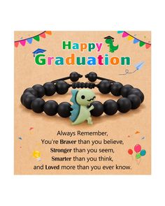 a bracelet with an image of a dinosaur on it and the words, happy graduation