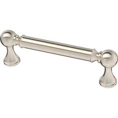 an antique style pull handle on a white background