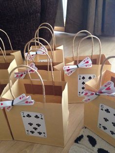 brown paper bags with playing cards on them